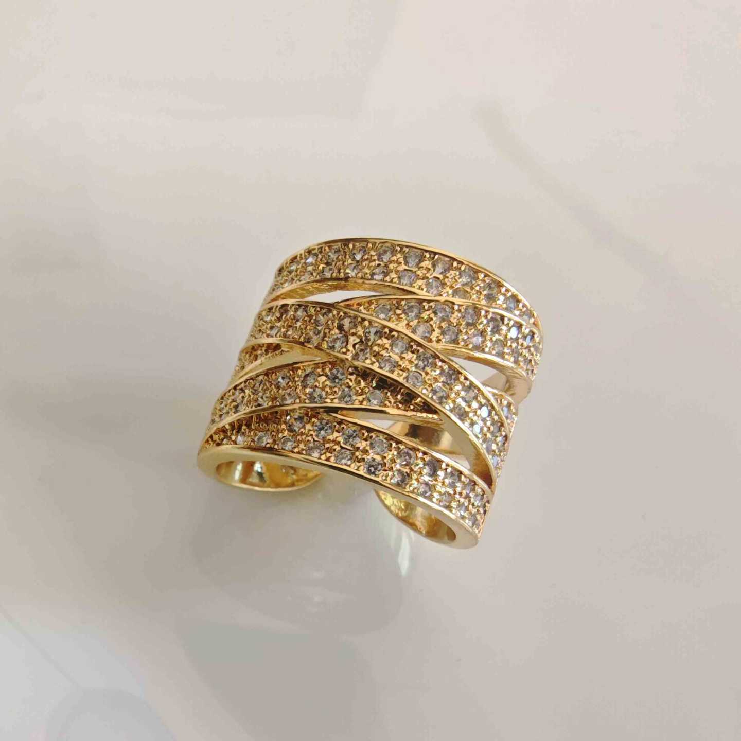 Anillo Bañado en Oro 5 Lineas Circones Cruzado Ajustable