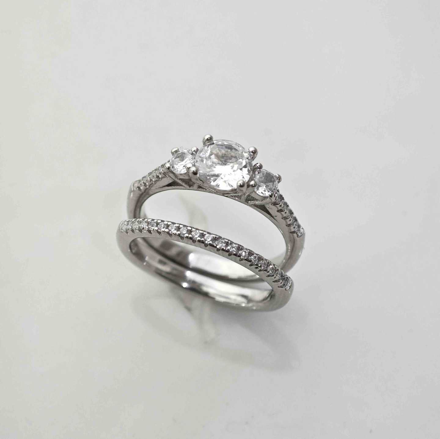Anillo de Plata925 Dos Juntos Un Solitario Y Un Medio Sintillo