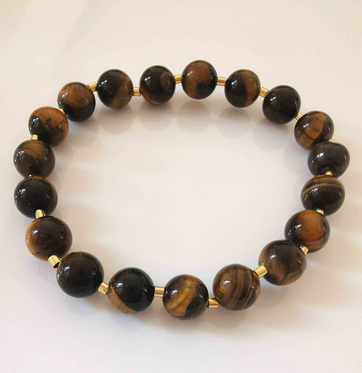 Pulsera Piedras Naturales Ojo de Tigre Esferas Grandes Separadores Dorados Elástica Energía Protección