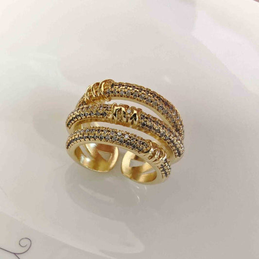 Anillo Bañado en Oro 4 Lineas Circones Cruzado Ajustable