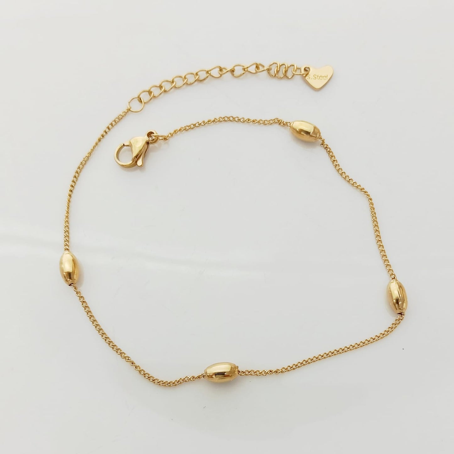 Tobillera Dorado 4 Pelotitas Ovalos