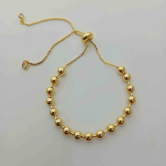Pulsera Bañado en Oro Pelotita Ajustable 5mm