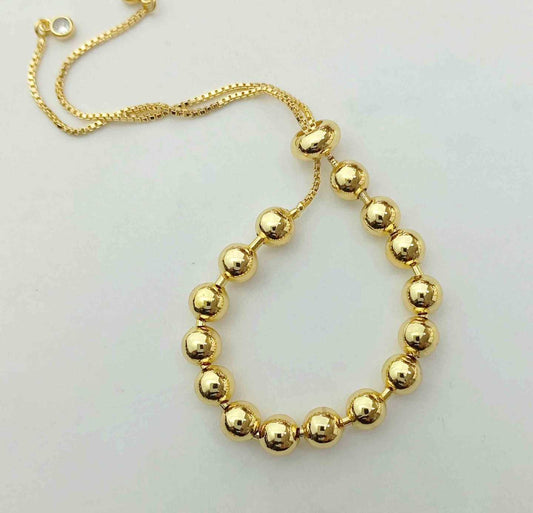Pulsera Bañado en Oro Pelotita Ajustable 6mm