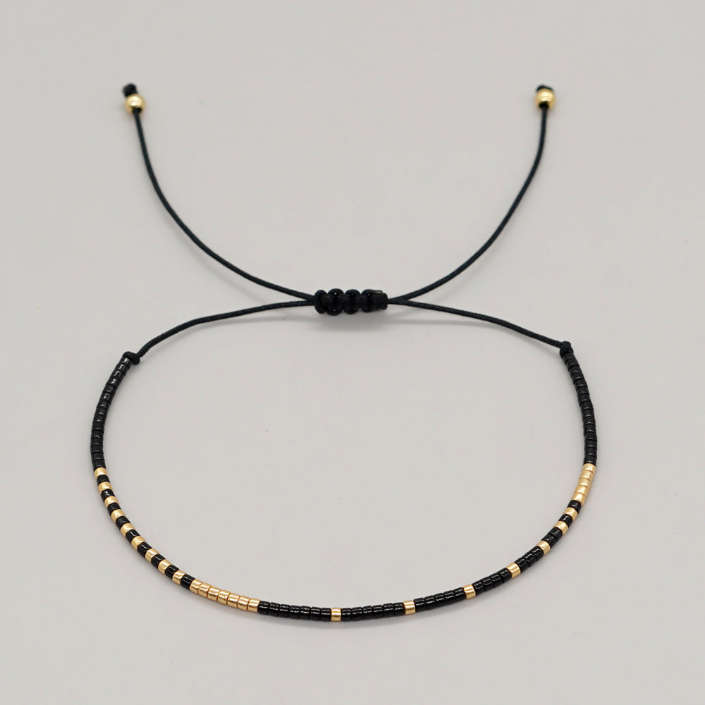Pulsera Miyuki Negro y Dorado