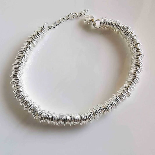 Pulsera Acero Inoxitable Bañado en Plata Crueso Argollas Lisos