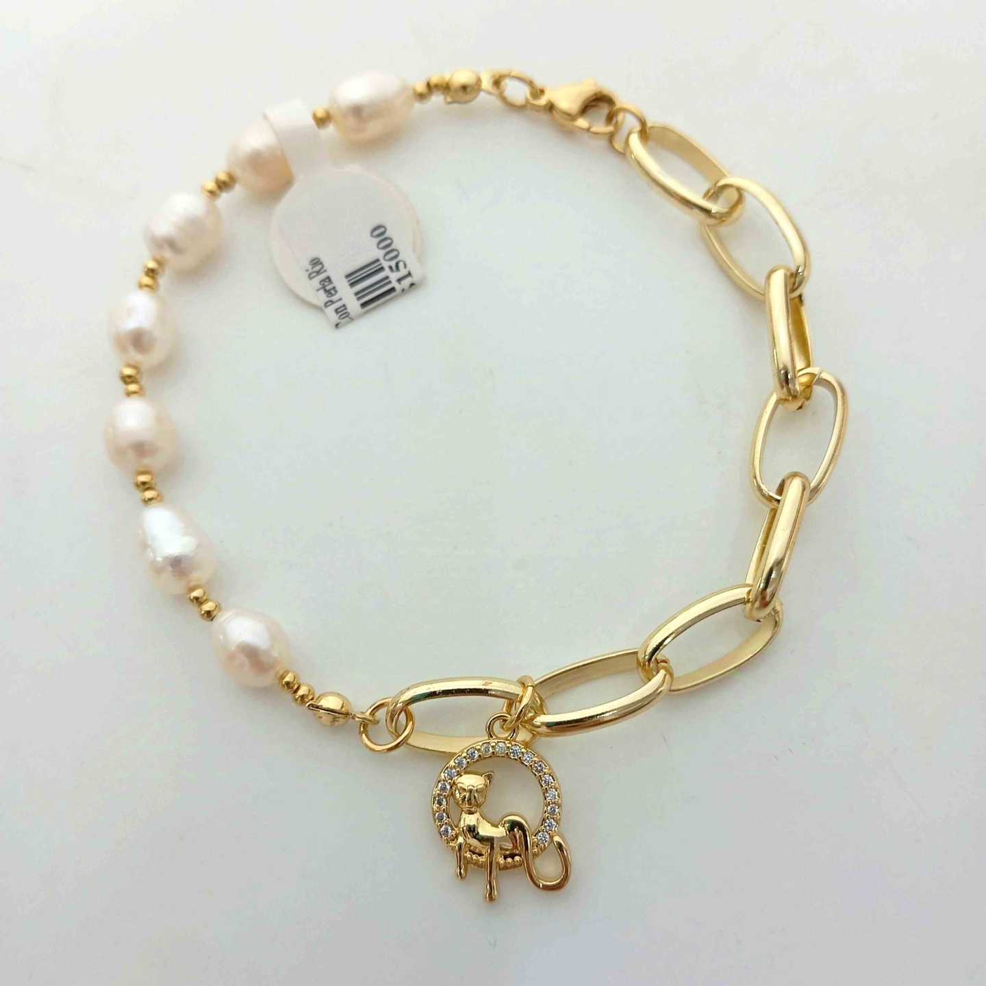 Pulsera Bañada en Oro 18k Perlas de Río y Cadena Paperclip con Dije Ojo Turco Pavé Circones