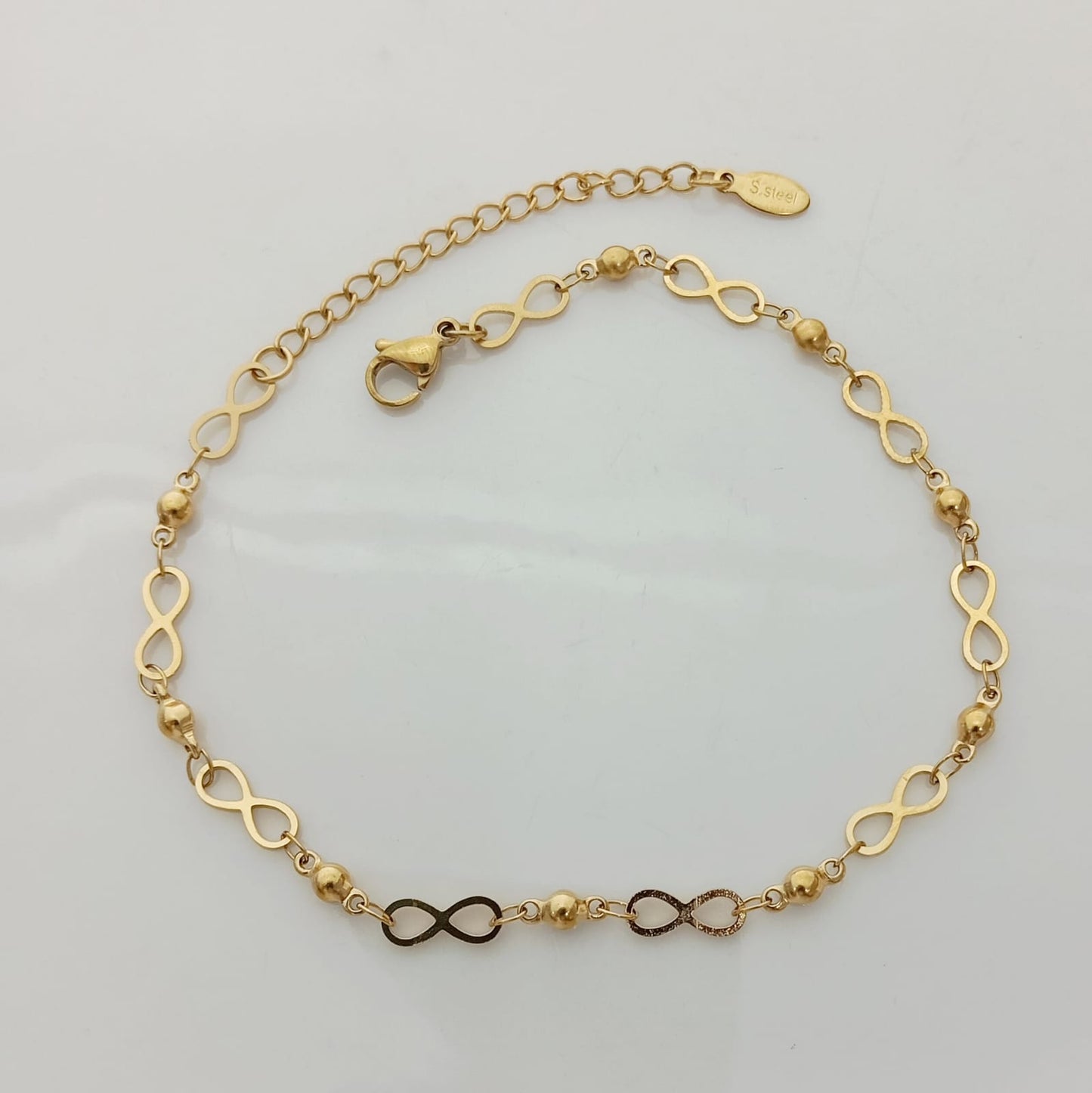 Tobillera Dorado Infinito Pelotitas